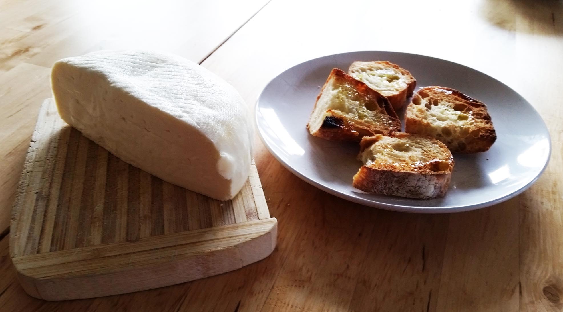 Samish Bay Cheese + toasted bread from the Breadfarm. Add 3 drops of Extra Virgin Olive Oil for perfection